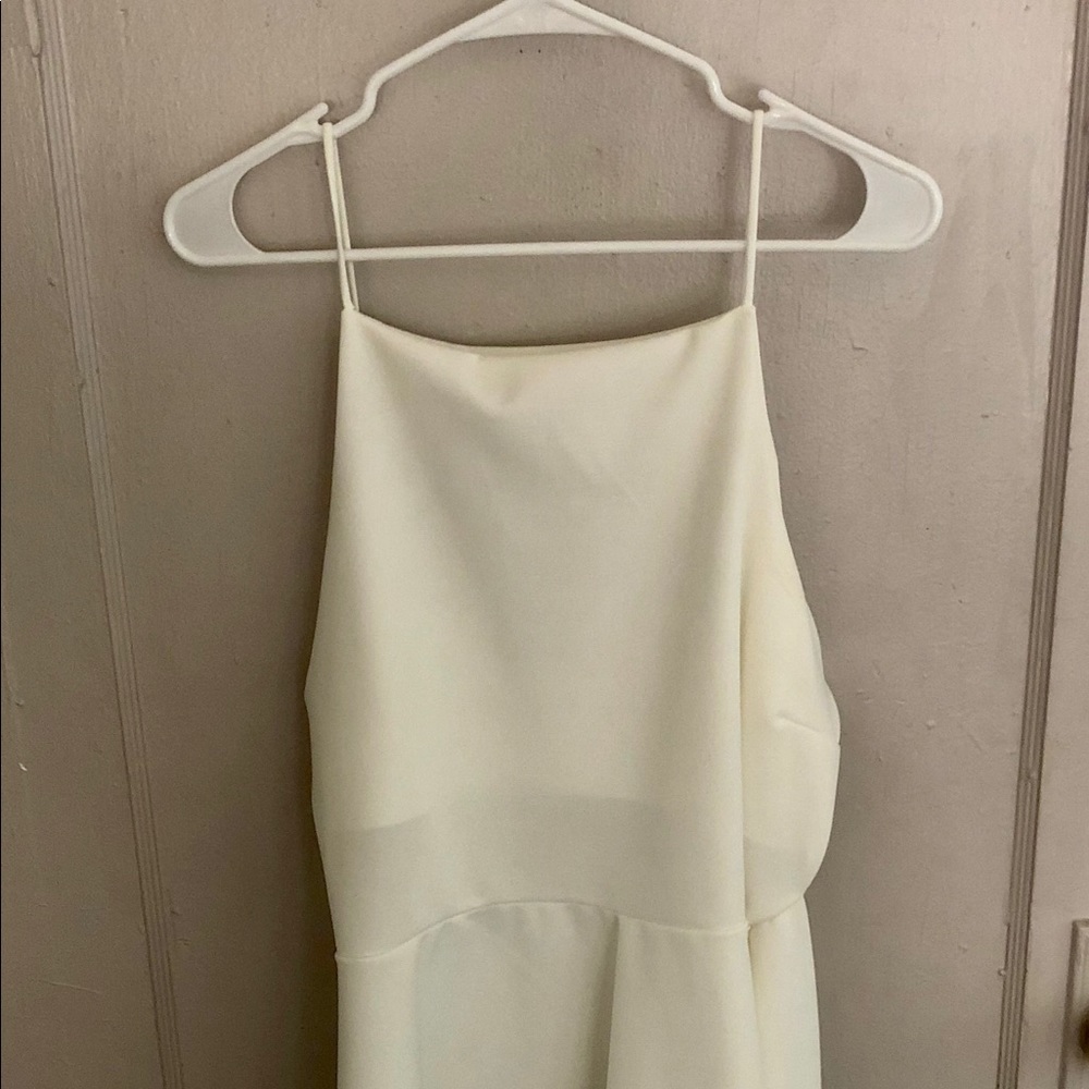 White angled cut top with waist tie